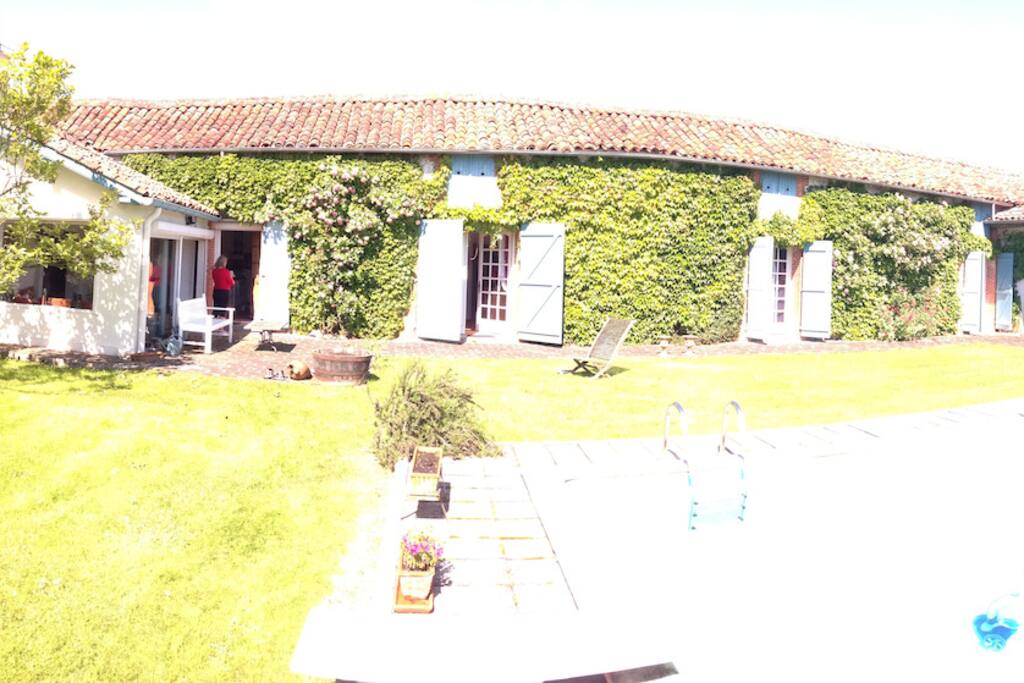 Rooms open onto pool & garden