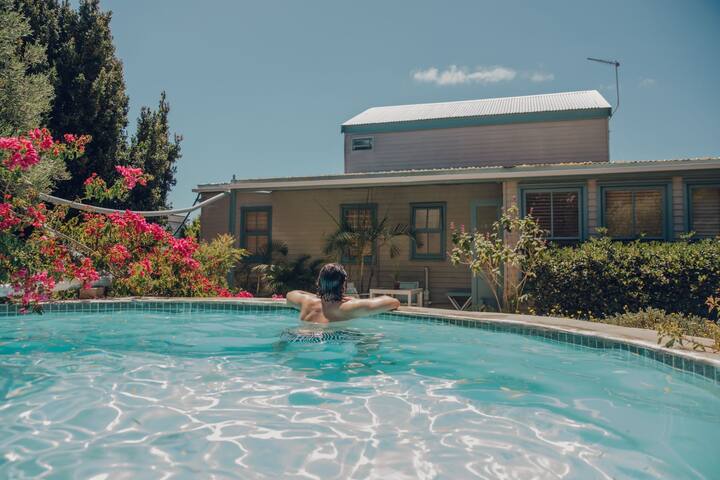 Coastal Tranquility with Lush Garden & Pool gallery image 3