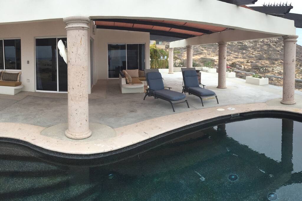Relax by the pool in the shade.