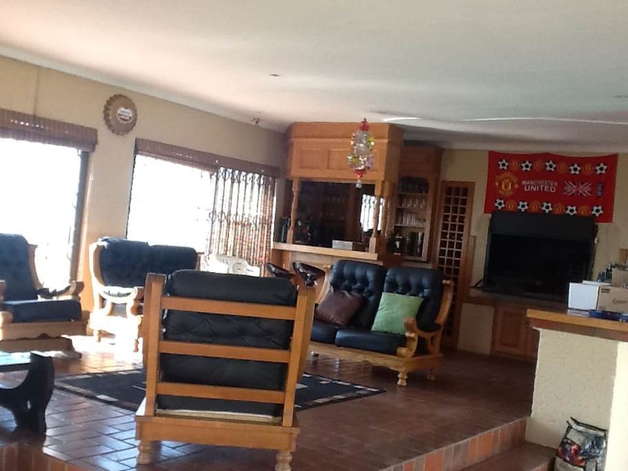bar are next to pool and veranda with spectacular view