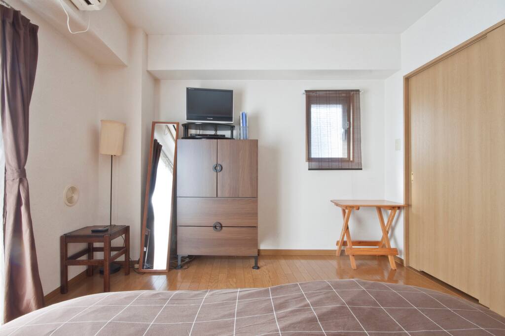 TV, DVD, AppleTV, Portable WiFi, iPod dock all live in this large room which also fits a double futon