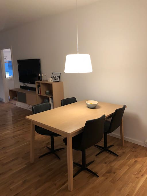 Dining table which expands to fit up to 8 people. Extra chairs are available as well.