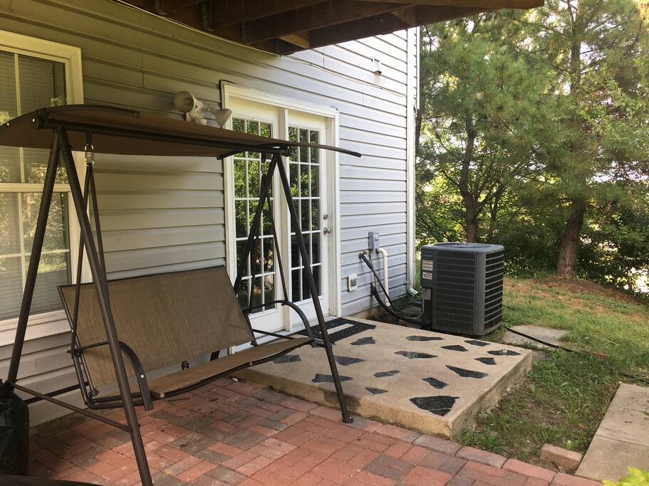 Lounge area outside with Swing and chairs