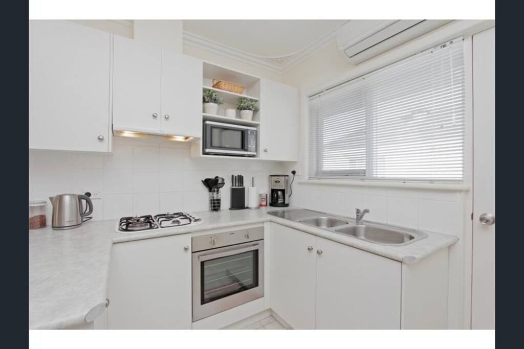 Fully Contained Kitchen including Microwave, Fridge, Gas Stove, Electric Oven, Tea/Coffee Supplies