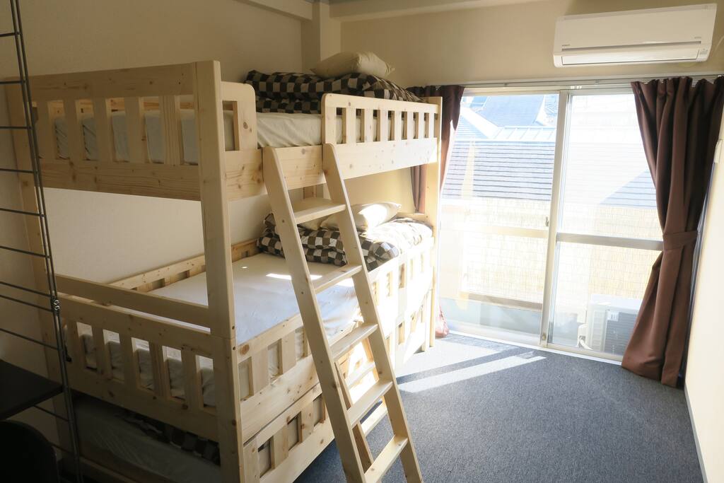 Sunny, clean, and comfortable guest room.