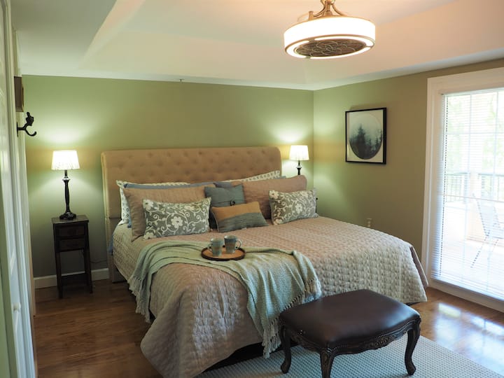 The Master bedroom has 2 full sized closets, TV, king sized bed, and a balcony that overlooks the river.  Rest, Relax, and Repeat. 