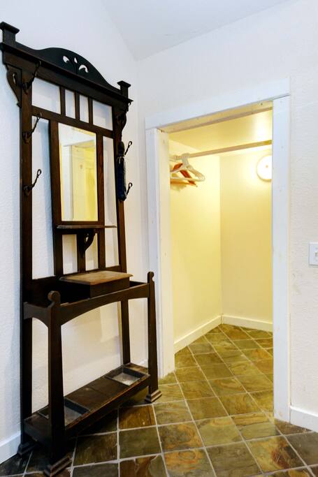 The entryway welcomes you with slate tile.