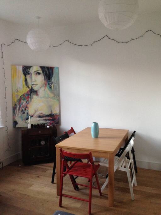 Dining area with table that can expand to seat 10