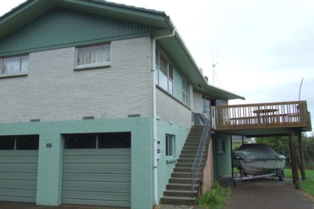 Street view. The motorboat is stored at the property but not available.