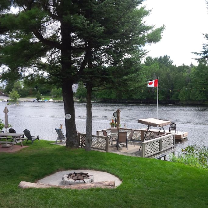 Custom built campfire pit, waterside deck and dock