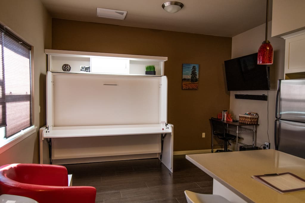 With the murphy bed closed as a usable desk.