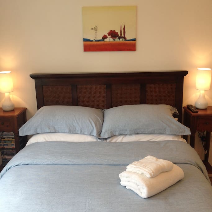 Double bed, firm mattress, Egyptian cotton bedding, luxury micro fibre duvet, black-out blind.