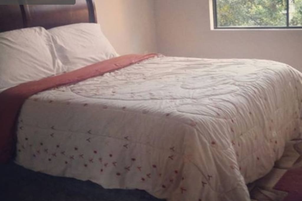 Cozy queen size bed made just for your comfort