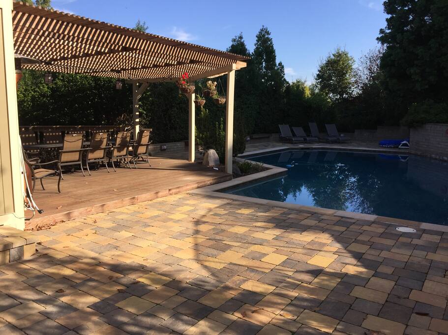 Pool, patio and deck view from kitchen