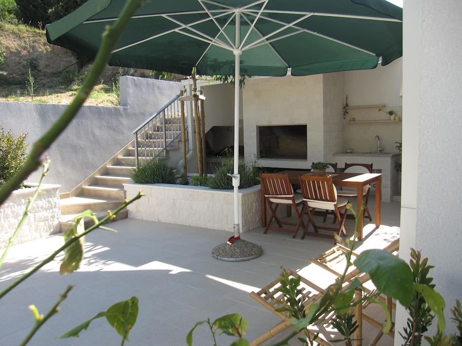 Terrace - part with summer kitchenette - table, barbecue and water sink