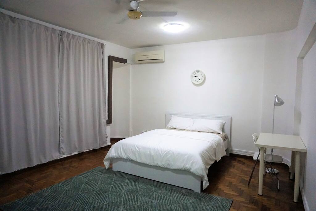 Large room with queen sized bed