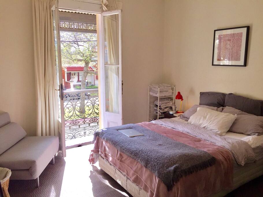 A beautiful perspective out on to tree-lined Rathdowne street with your own private balcony.