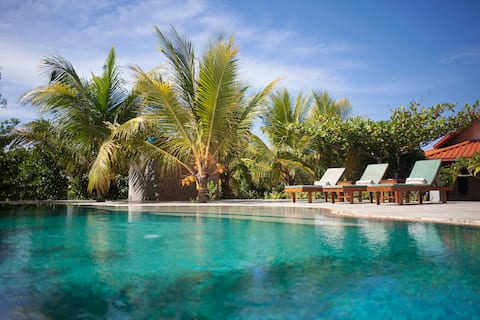Stylish lakefront safari villa with pool near Yala