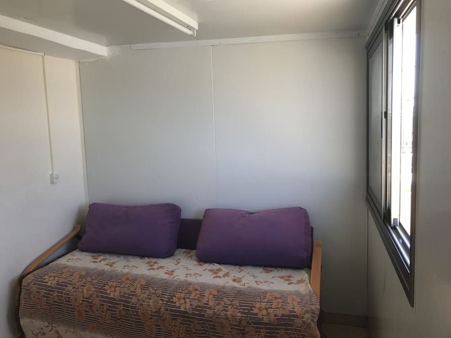 sleeping room with a TV