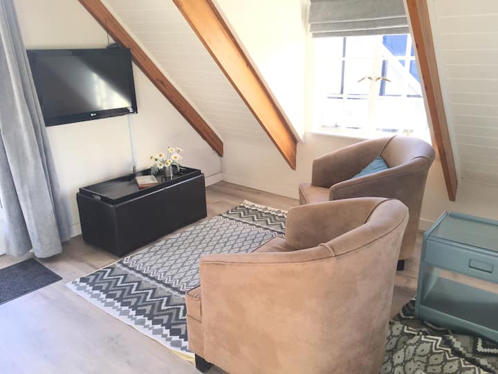 Ndenjëse për shikimin e televizorit,relaksimin ose leximin