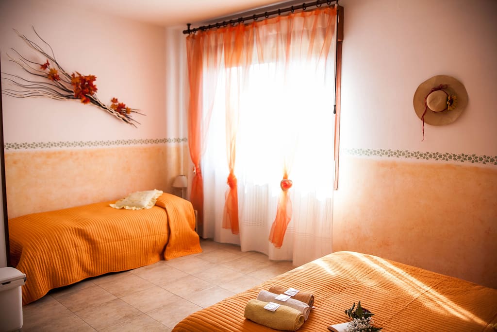 the family room with one large bed and one single bed