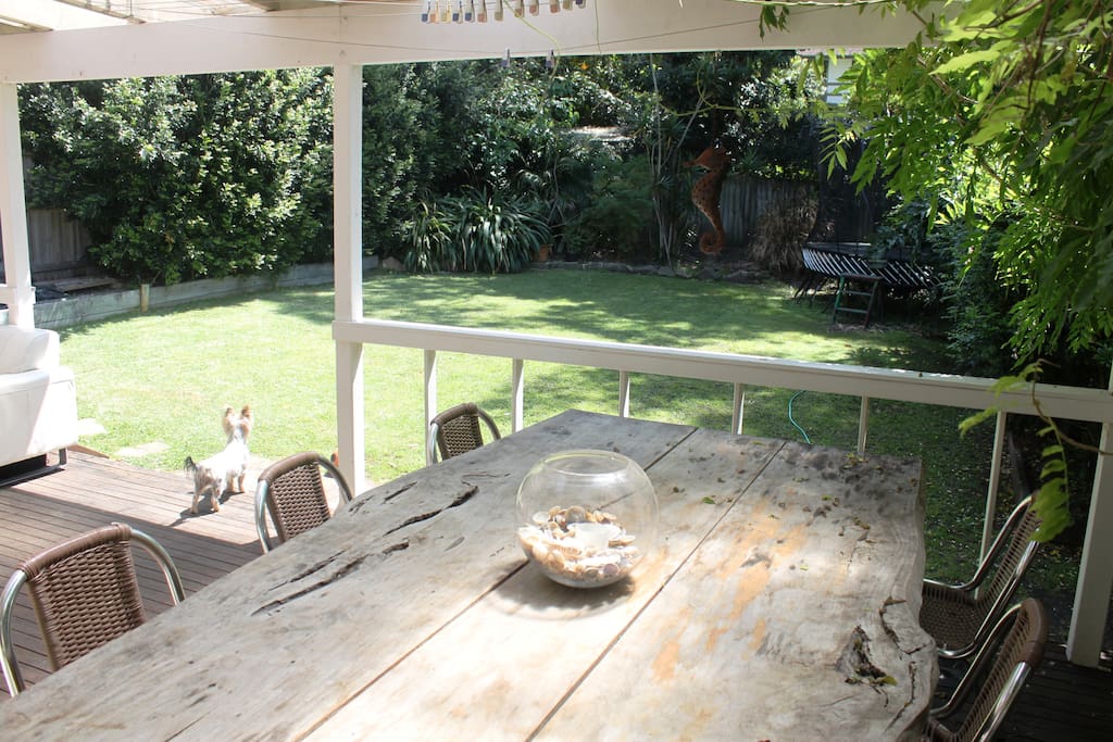 Outdoor seating. Sunny protected and private back garden. Springfree trampoline