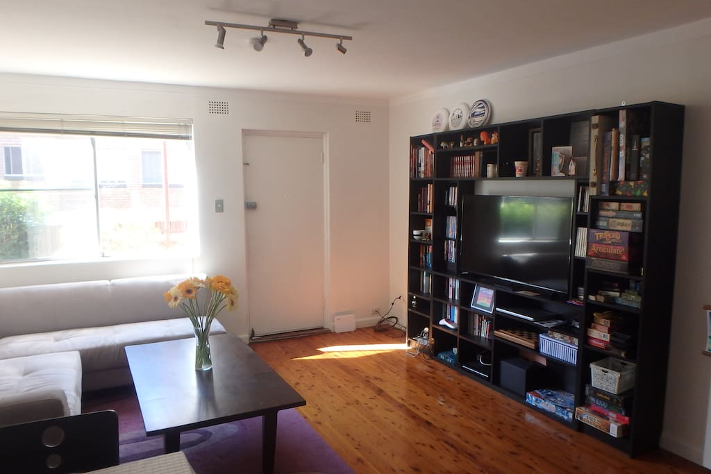 Lounge room with TV, consoles, and board games for you to enjoy