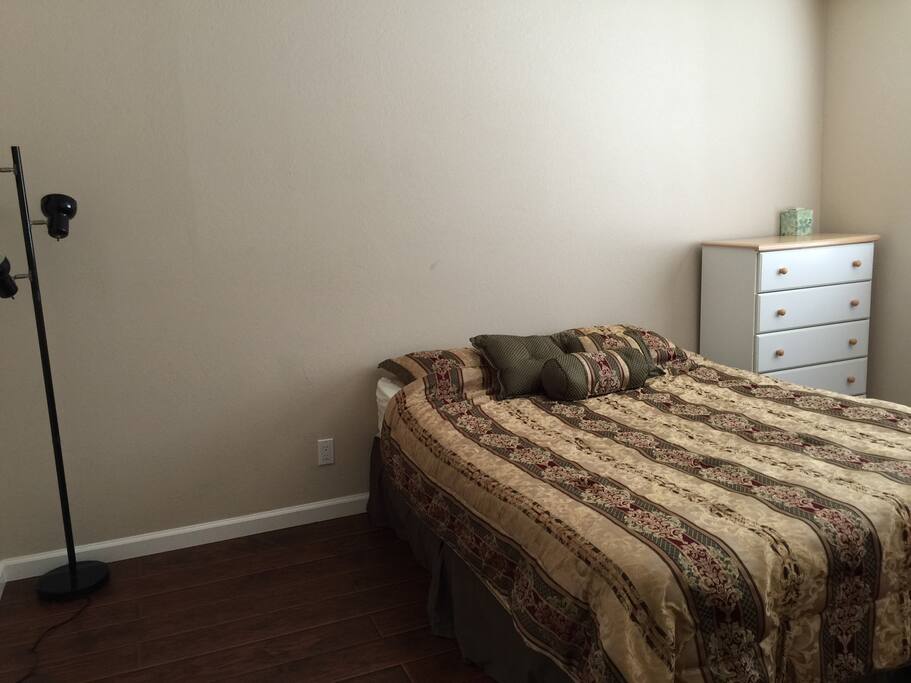 King size bed in the master bedroom