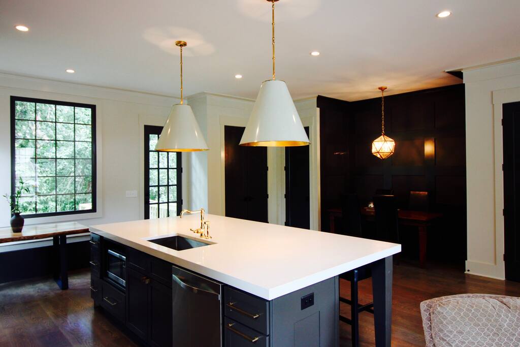 Entire slab of quartz for island with designer lighting