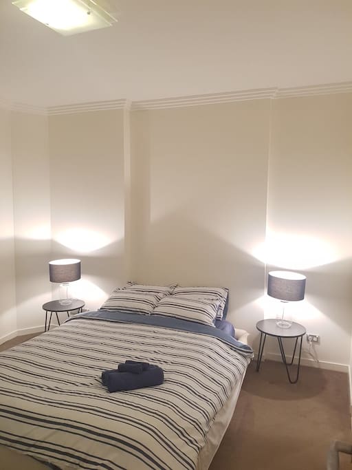 Simple and clean main bedroom