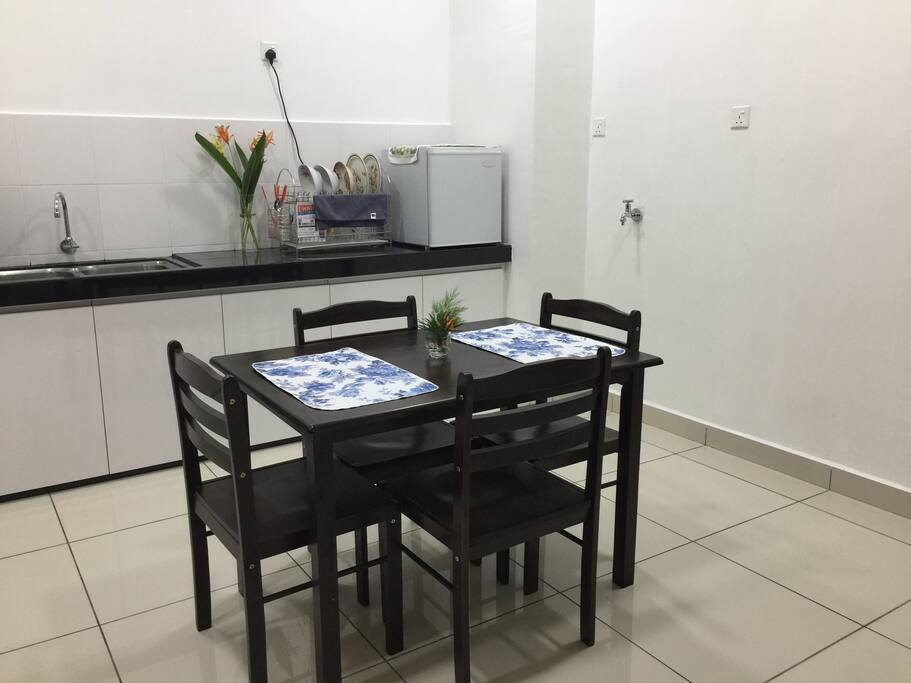 Dinning area •dinning table and chairs •tablewares •refrigerator