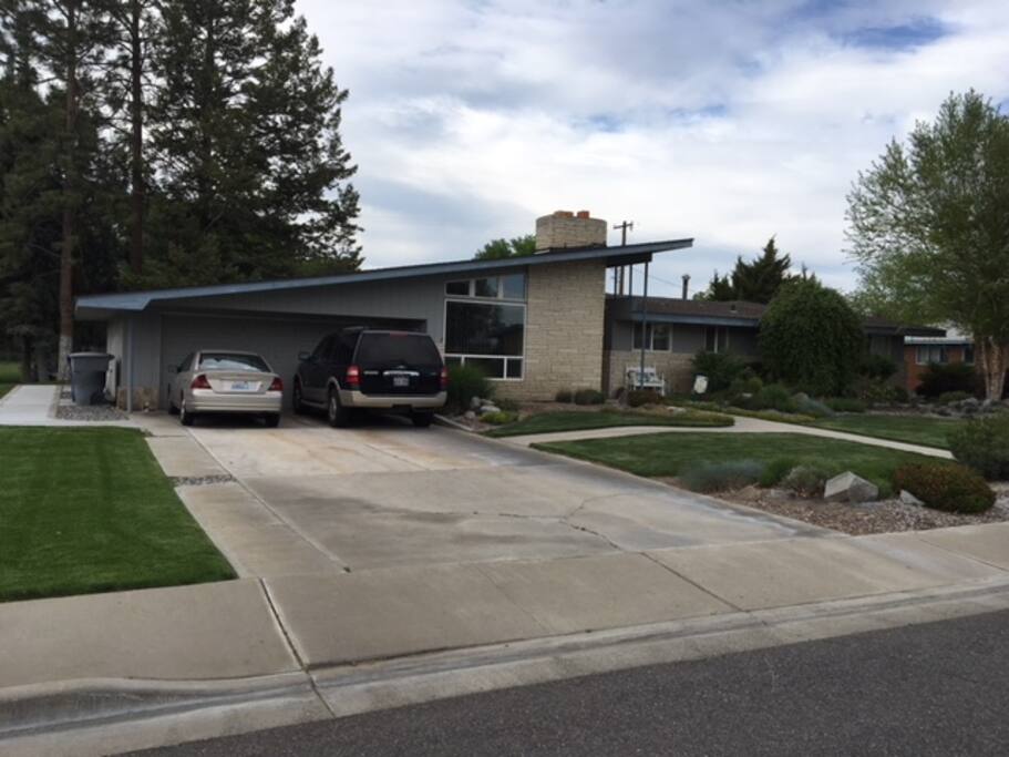 Parking area and walkway to entrance in back