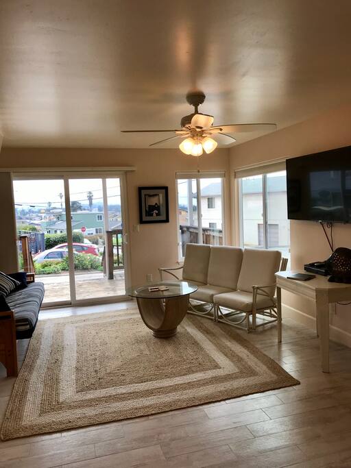 Great room downstairs w/ 50" TV.