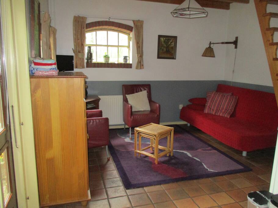 woonkamer met bedbank
