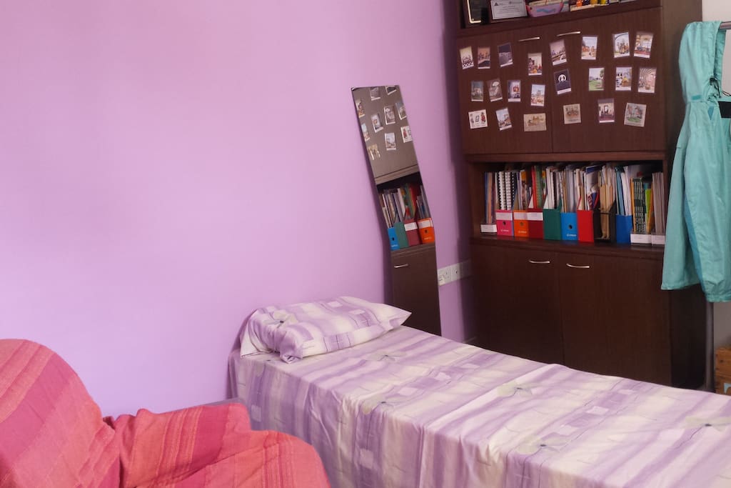 The available bedroom (with mirror) in natural light from the window. Blankets also available.