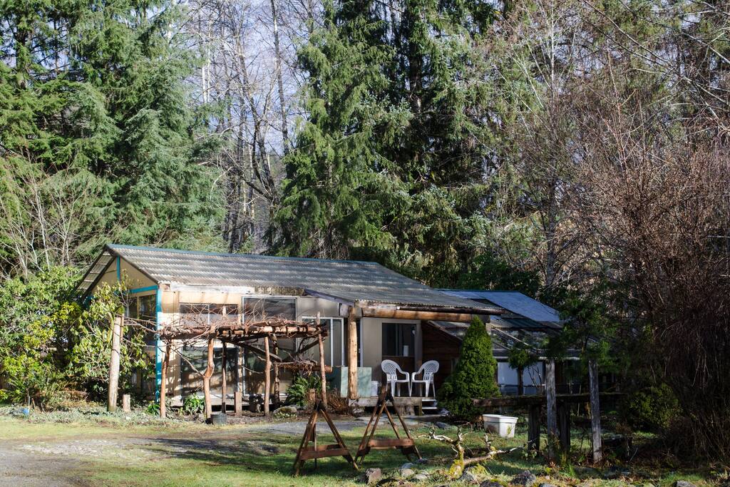 The Creek Cabin with view of front porch.