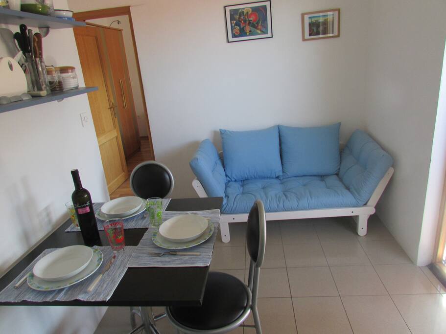 Dining room with sofa