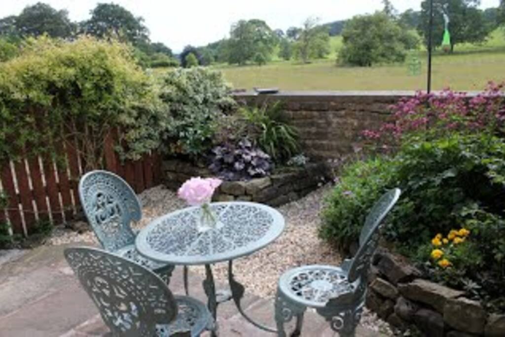 South facing rear garden with table and chairs