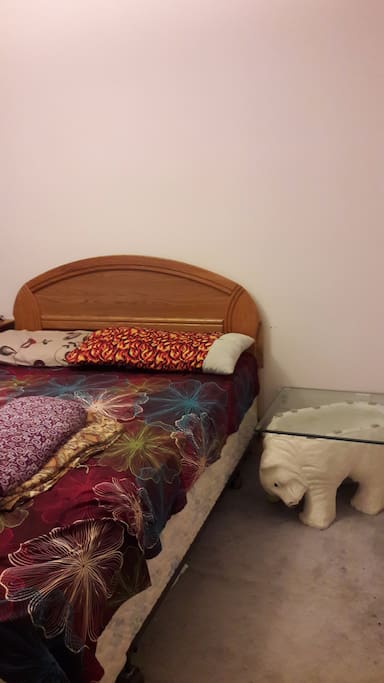 Queen bed with cute bedside table