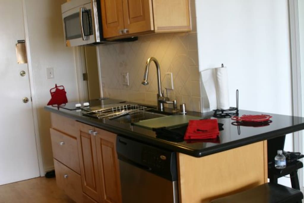 2 Glass Top Built in 2 Burners, and a Brand new Built-In LG SS Microwave Oven with exhaust fan.