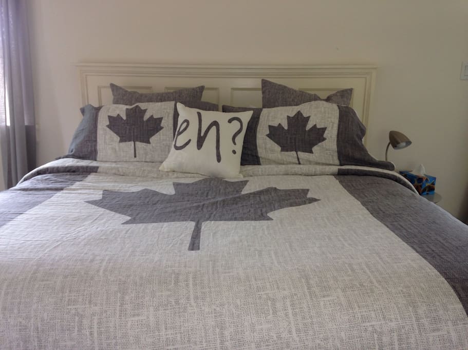 New king size mattress, bed frame and bedding.