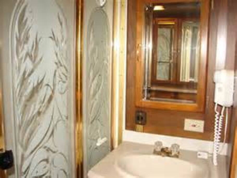 Bathroom...glass shower on the left