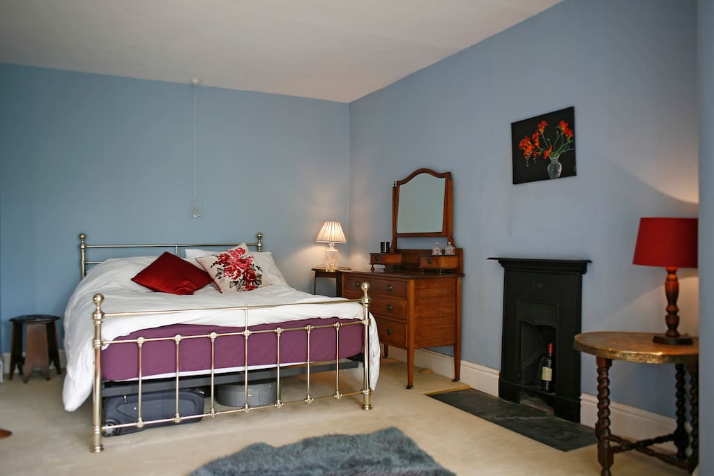 Main bedroom with period furniture (possibly owned by the artist who built the house!)