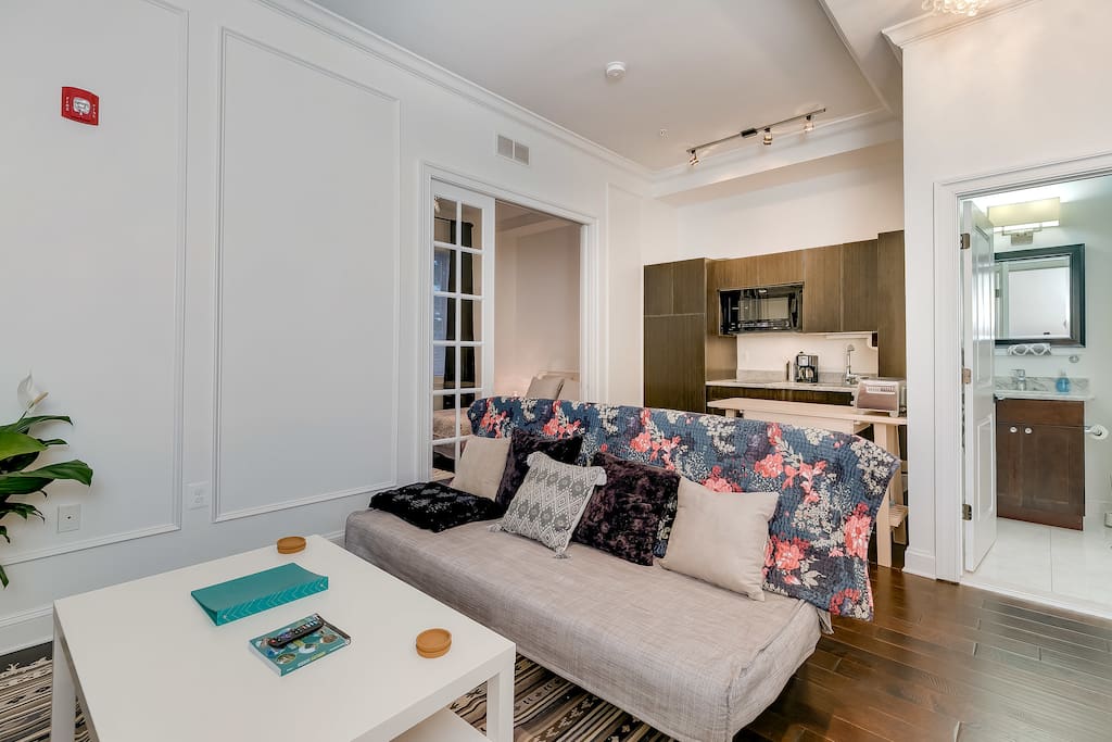 Kitchen and living room w pull out queen sleeper, extra linens available.