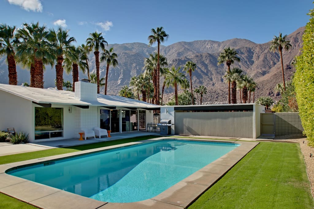 Enjoy almost 1/3 acre property with huge pool and views everywhere you look!