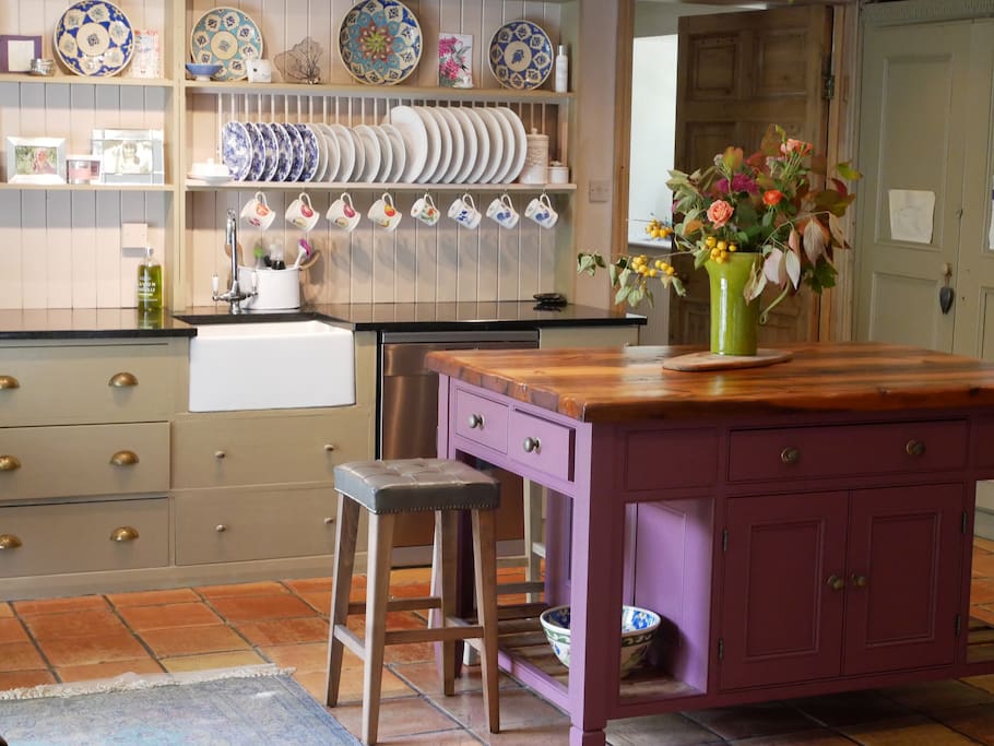 Updated kitchen October 2018 with Island, Aga cooker and large Siemens conventional oven, new Fisher Paykel fridge/freezer, Miele Dishwasher, comfy bar stools, chair, French Windows leading on to garden