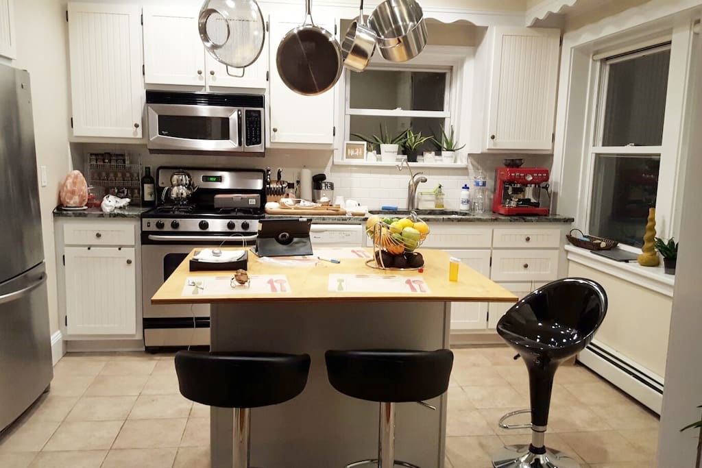Fully equipped kitchen with espresso machine