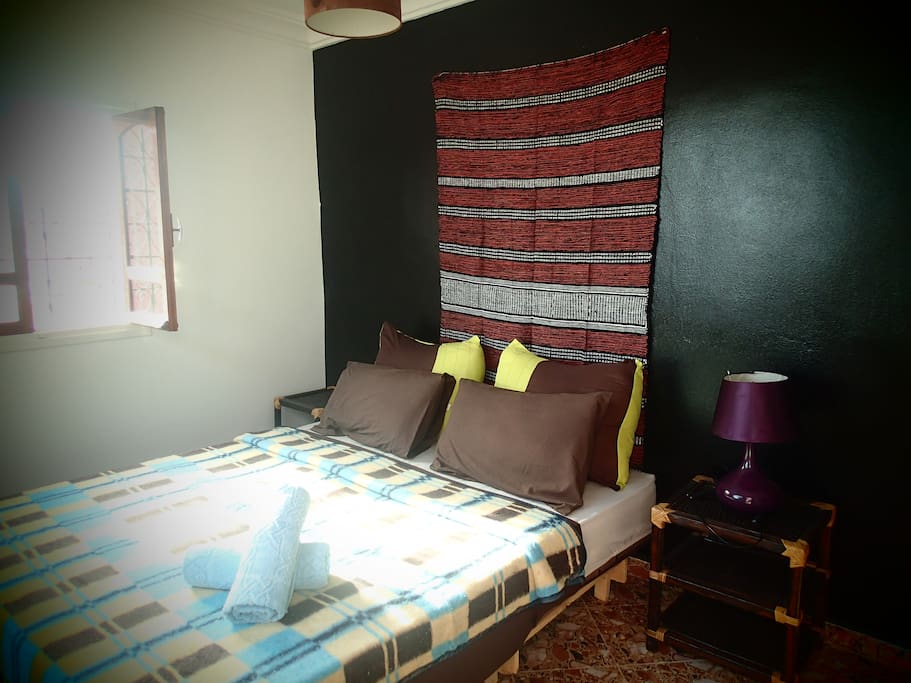 Chambre 2ème étage avec accès sur la terrasse