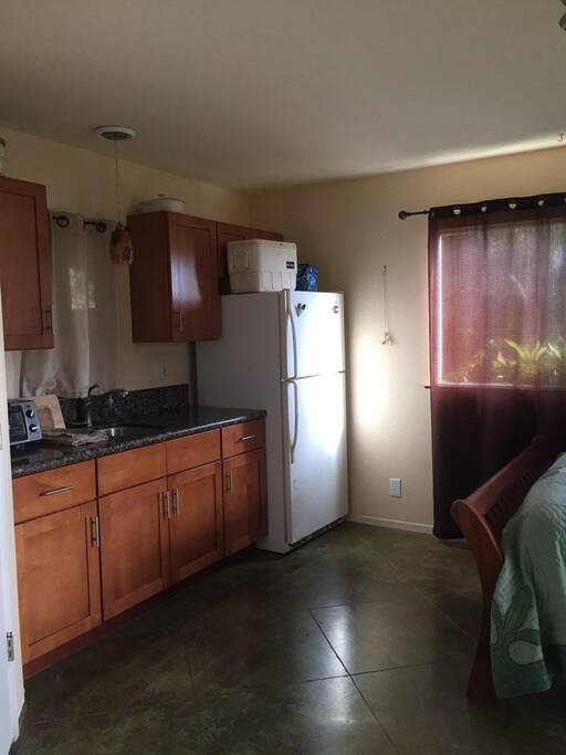 kitchen with full size fridge