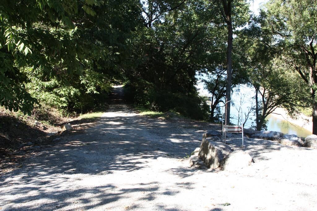 Treed road/path to: dock, Shell Knob bridge & public boat launch